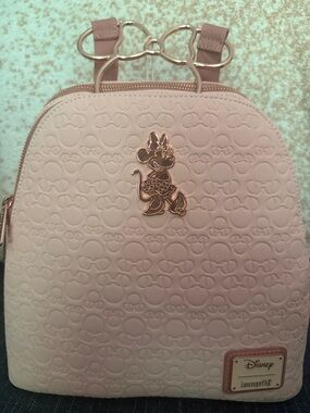 Loungefly Minnie Mouse Embossed Pink Mini Backpack with Rose Gold Bow